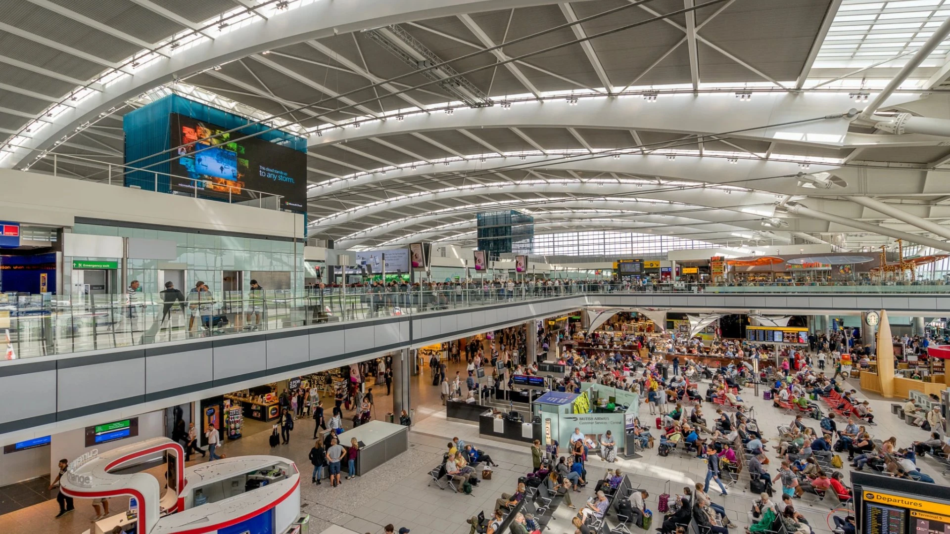 Heathrow Terminal 5 departures hall with sweeping glass roof