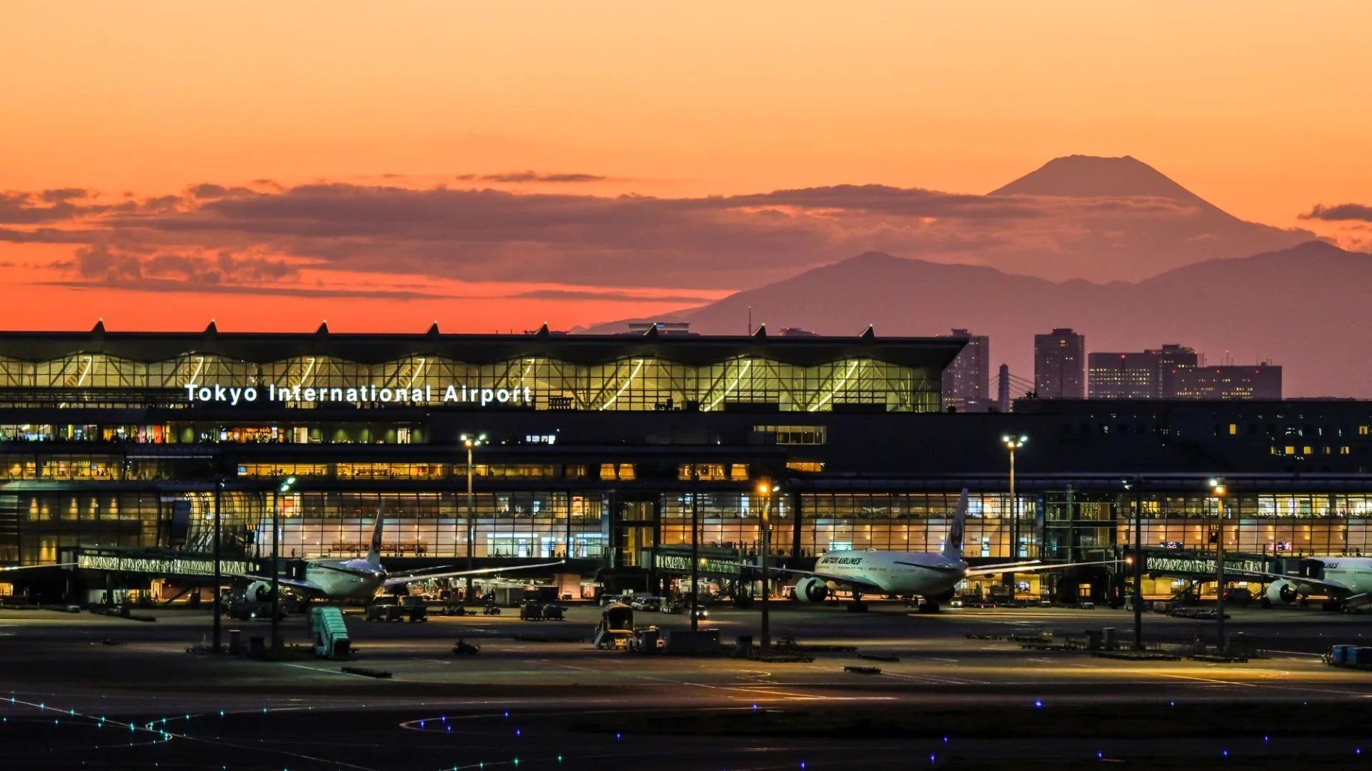 Tokyo Haneda Terminal 3 observation deck at night with city skyline